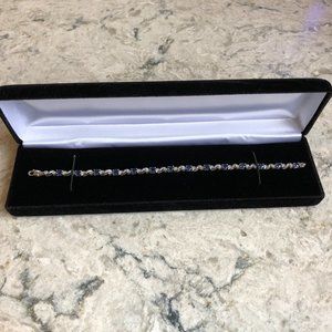 NIB--14 karat white gold sapphire and diamond bracelet